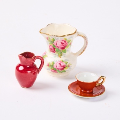 A Collection of Three Miniature Jugs and Teacup