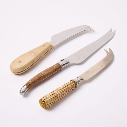 A Collection Of Three Rustic Cheese Knives