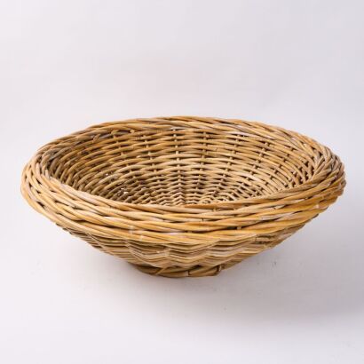 An Oversized Vintage Wicker Bowl