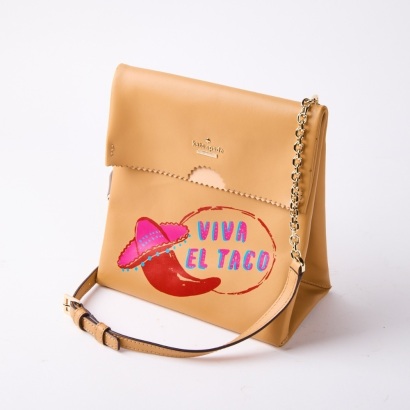 A Kate Spade Viva el Taco Handbag