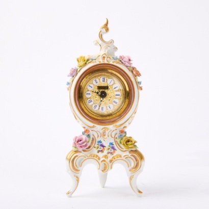 A Dresden West-German Clock with Porcelain Face