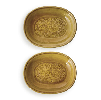 A Pair of Chinese Qing Dynasty Yellow Glazed Saucers decorated with dragon pattern