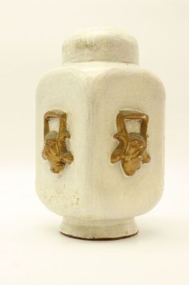 A Chinese porcelai figurine and clay candle holder