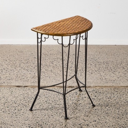 A Wrought Iron And Rattan Demilune Side Table