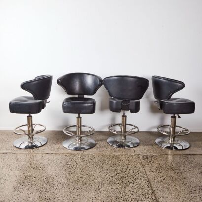 A Set of Four Bar Stools with Bull Horn Backrests