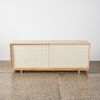 A Custom Made Contempory Sideboard With Peg Board Doors