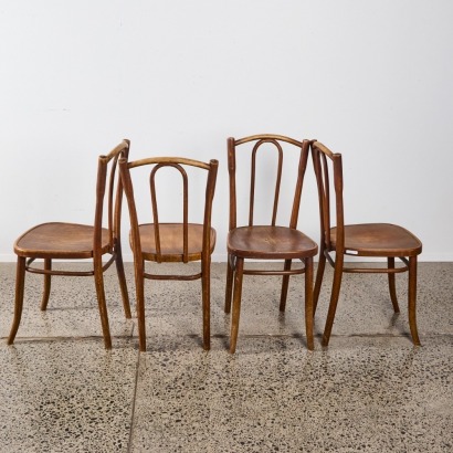 A Set of Four Vintage Thonet Model 56 Bentwood Dining Chairs