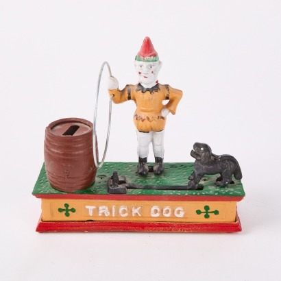 A Vintage Cast Iron Trick Dog Money Bank