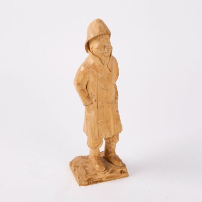 A Folk Art Carving Of Jo Daniel