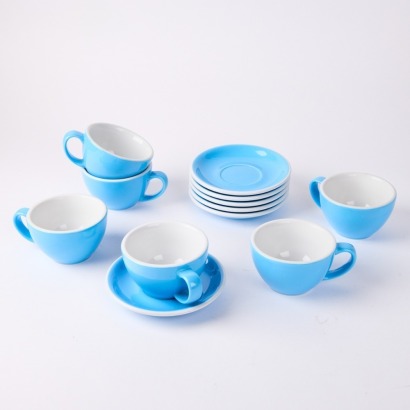 A Set of Six ACME Breakfast Cups & Saucers in Blue Colorway