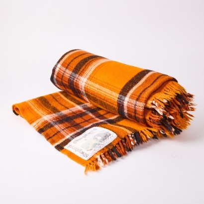 A Shephered Huia Wool Travel Rug