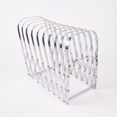 A Vintage Extendable Accordion Chrome Magazine Sorter By Luther Evans