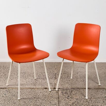 A Pair Of Jasper Morrison Chairs In Orange For Vitra