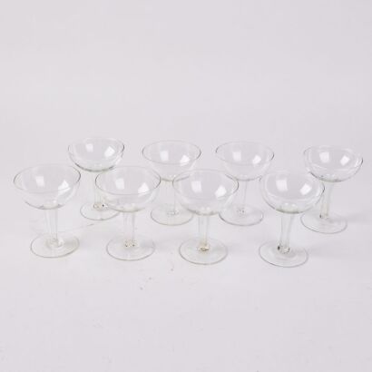 A Set Of Eight Hollow Stem Champagne Coupes