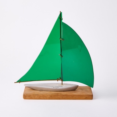 A Modernest Acrylic and Cast Alloy Yacht on Kauri Stand
