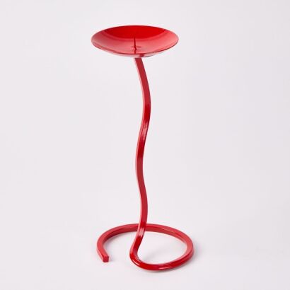 A Retro Red Metal Candle Stick