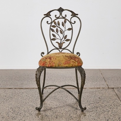 An Iron Chair with Decorative Tapestry Upholstery