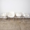 A Set of Four Hobnob Sleigh Based Chairs By Sebel