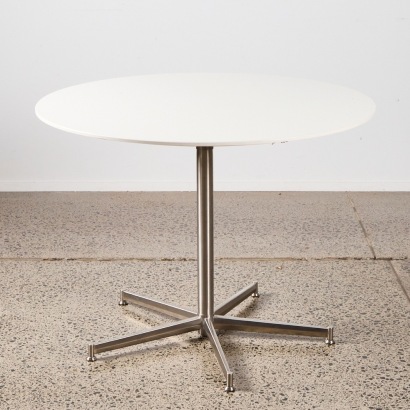 An Eames Style Group Circular Table With Stainless Steel Base