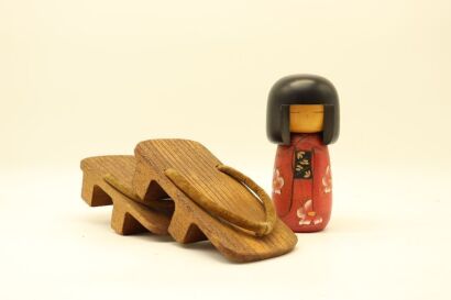 A pair of Japanese 20th clogs and one puppet