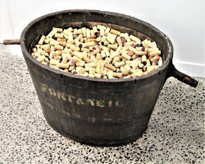 (1) 19th Century grape receival bin with an assortment of corks