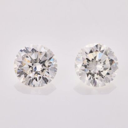 A Pair of Matching Round Brilliant Cut Diamonds totalling 2.10cts