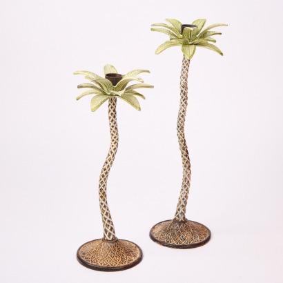 A Pair of Cast Iron Palm Tree Candlesticks