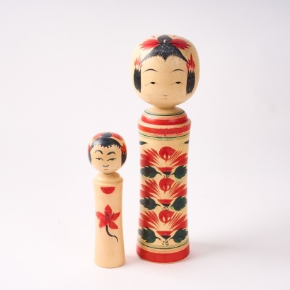 A Pair Of Japanese Kokeshi Dolls