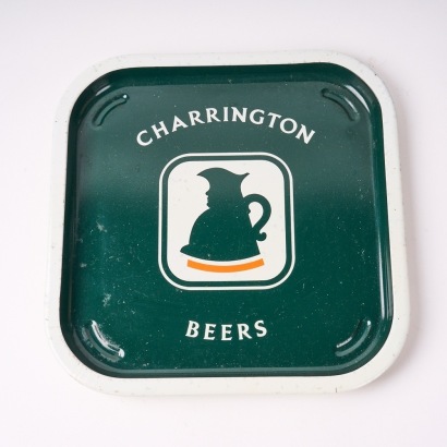 A Vintage Enamel Charrington Beer Serving Plate