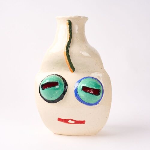 An Outsider Art Pottery Faces Vase