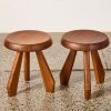 A Pair Of Tabouret Berger Walnut Stools By Charlotte Perriand For Cassina