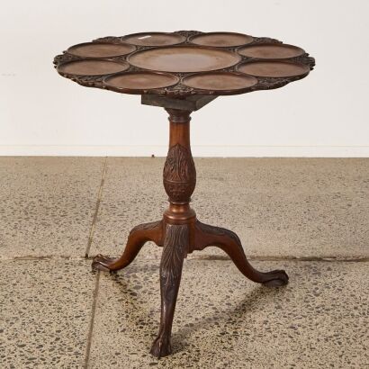 A Round Games Table With Claw Feet