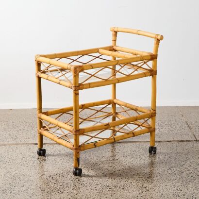 A Two Tier Glass Cane Bar Cart