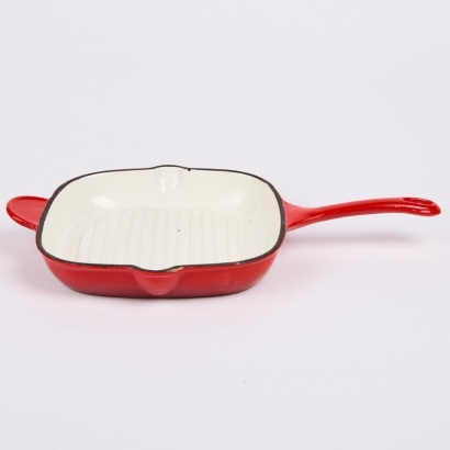 A Large Red Enamel Skillet