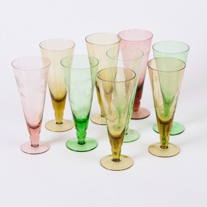 A Set Of Nine Etched Champagne Coups