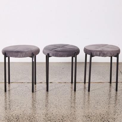 A Trio of Felted Grey Upholstered Stools
