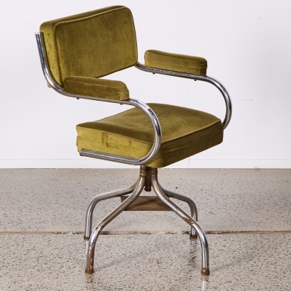 A Mid Century Industrial Chair In Green Upholstery