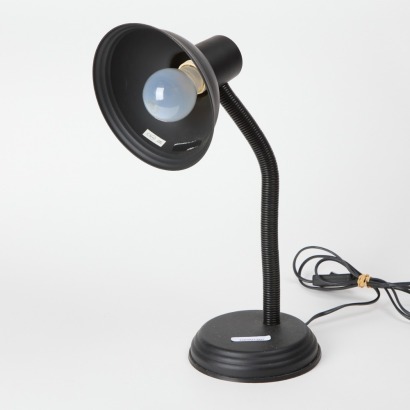 A Retro Adjustable Lamp In Black