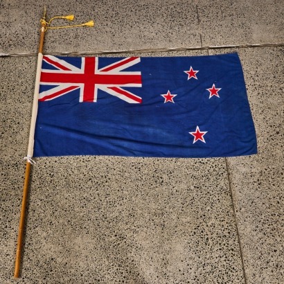 A Circa 1950s New Zealand Flag On Pole by Hutcheson Wilco And Son