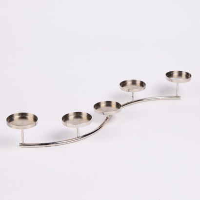 A Cotemporary Stainless Steel Curved Candelabra