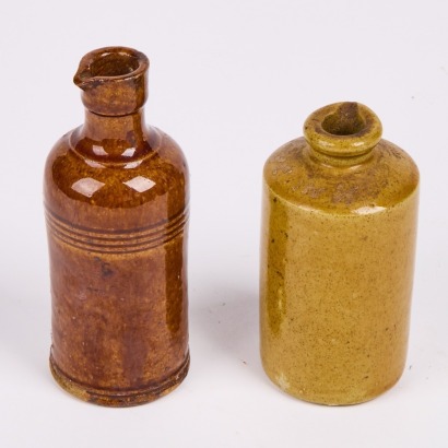 A Pair of Ceramic Oil Bottles