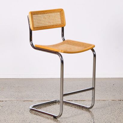 A Cantilever Bar Stool In The Style Of Marcel Breuer