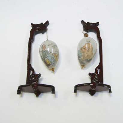 Two Chinese inside- painted ' figural' glass egg ornaments