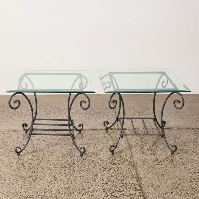 A Pair Of Wrought Iron Bedside Tables With Bevelled Edged Glass Top