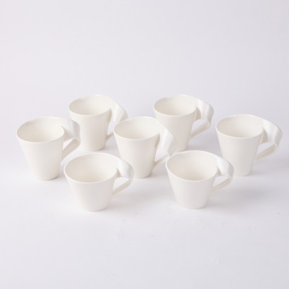 A Collection of Seven Villeroy & Boch Quirky Coffee Cups