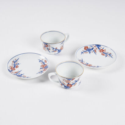 Two Sets of Japanese Blue and White and Iron-Red Cups and Dishes