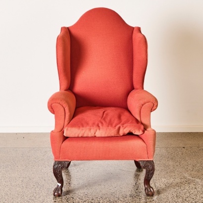 A Red Armchair with Animal Claw Feet