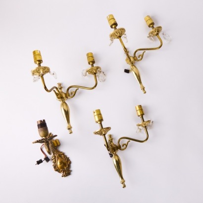 A Collection of Four Wall Sconces