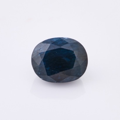 A Loose 5.30ct, Oval Cut Dark Greenish Blue Sapphire