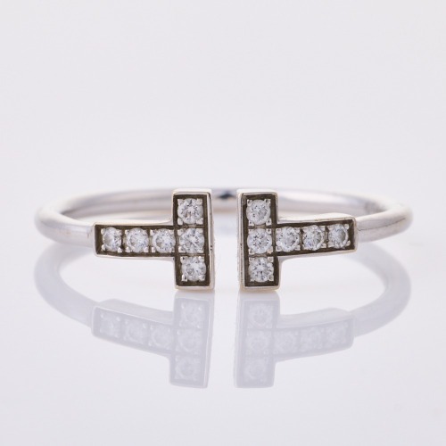 Tiffany & Co, 18ct White Gold, .13ct Tiffany "T" Diamond Ring